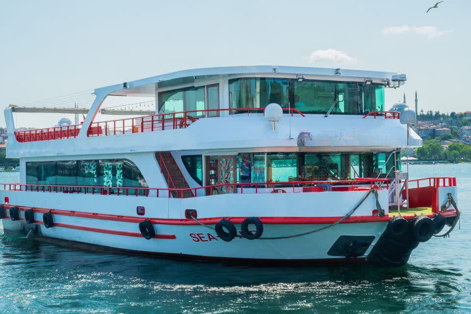 a boat that conducts guided tours on bosphorus