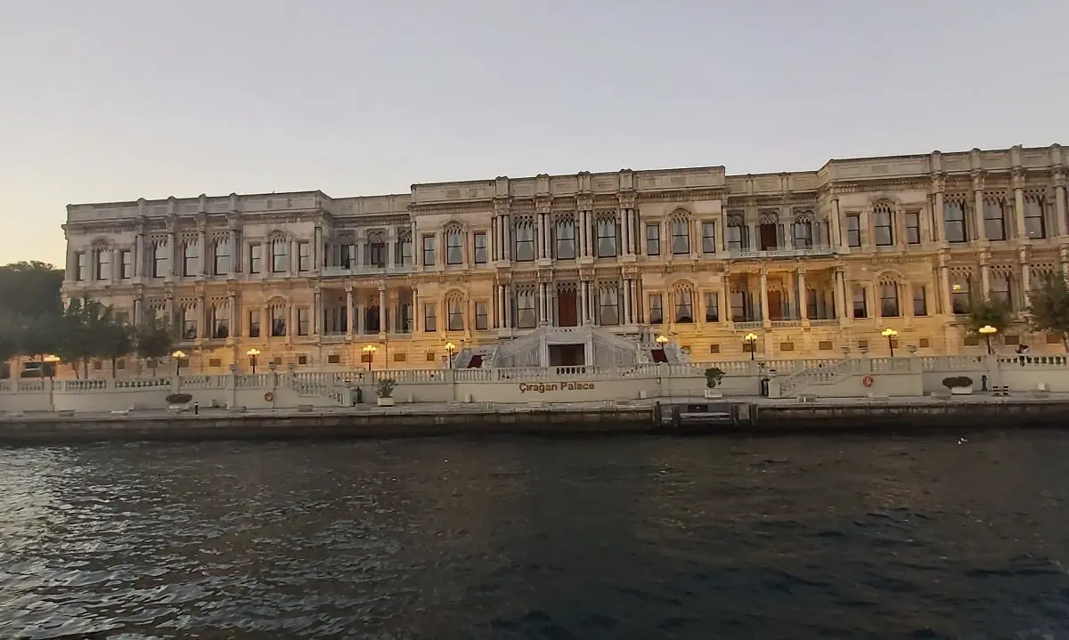 Sunset tour boat cruising on the Bosphorus with a view of the Dolmabahce Place